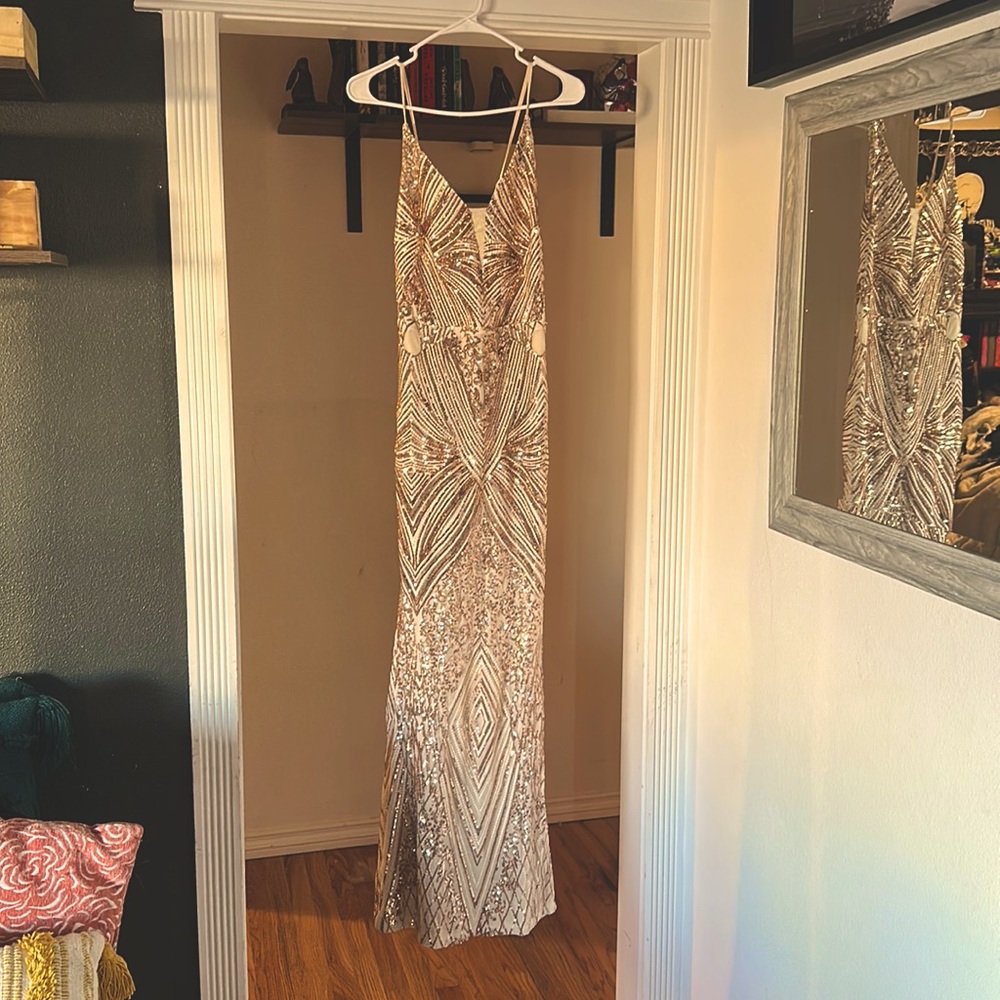 Gold sequined evening gown. Great quality. Very beautifully made.